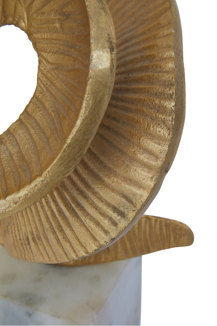 Evra Gold Sculpture On White Marble Base - Macro