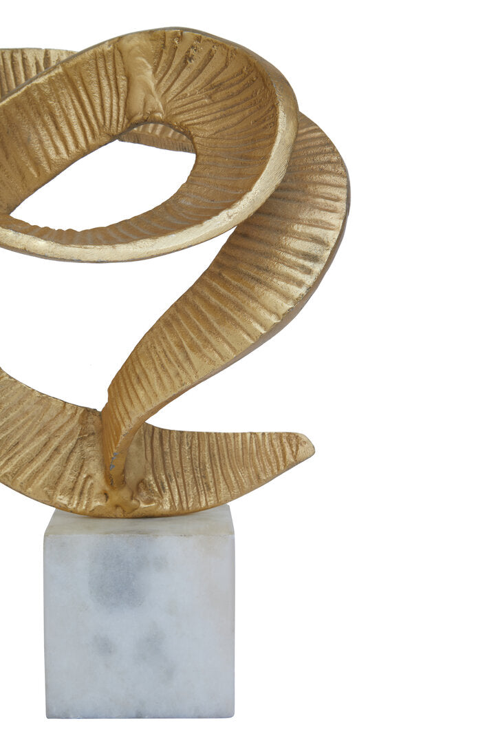Evra Gold Sculpture On White Marble Base - Macro